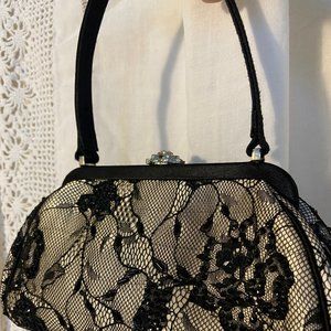 Black mesh over blush satin evening bag